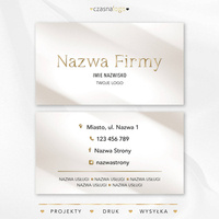 Elegancki projekt złoconej wizytówki na beżowym satynowym tle