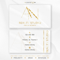 Projekt wizytówki z klasyczną czcionką i złotymi dodatkami