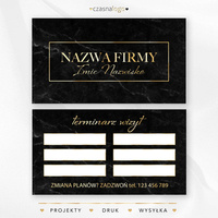 Złoty elegancki projekt terminarza wizyt na czarnym marmurowym tle