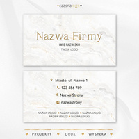 Elegancki projekt złoconej wizytówki na białym marmurowym tle