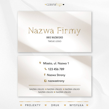 Elegancki projekt złoconej wizytówki na beżowym satynowym tle