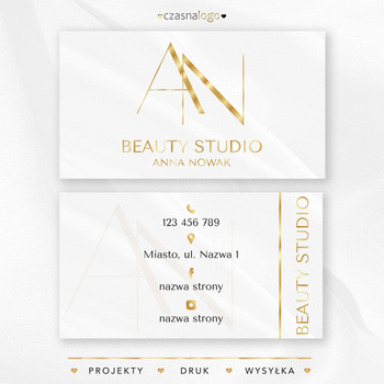 Projekt wizytówki z klasyczną czcionką i złotymi dodatkami