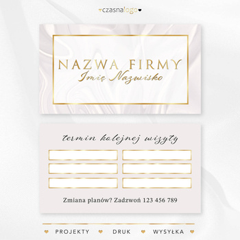 Projekt złoconego terminarzyka wizyt na jasnym satynowym tle